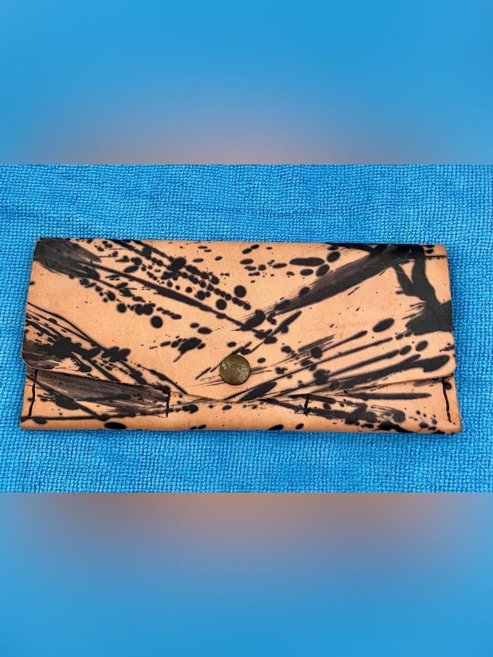 Ilundi Leather Clutch Wallet in Tan with Black Splatter